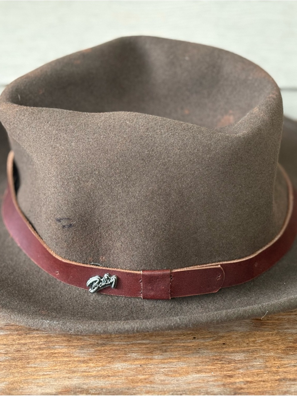 Bailey of Hollywood wool hat features a leather band with a silver logo pin.